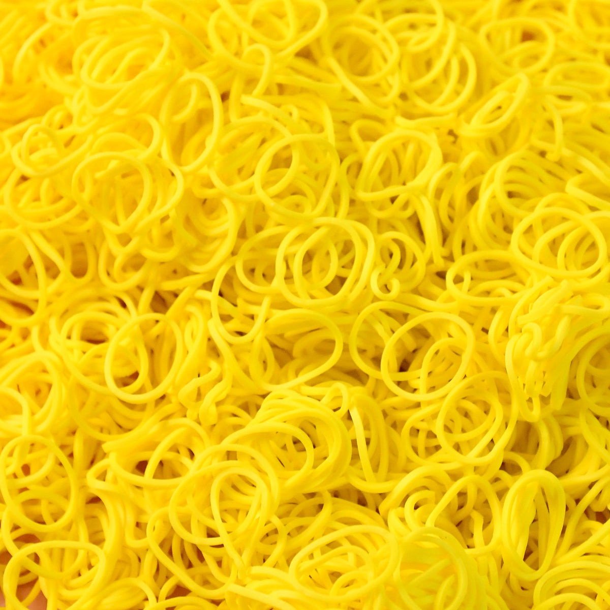 Elastic rubber bands laid out on surface showcasing durability