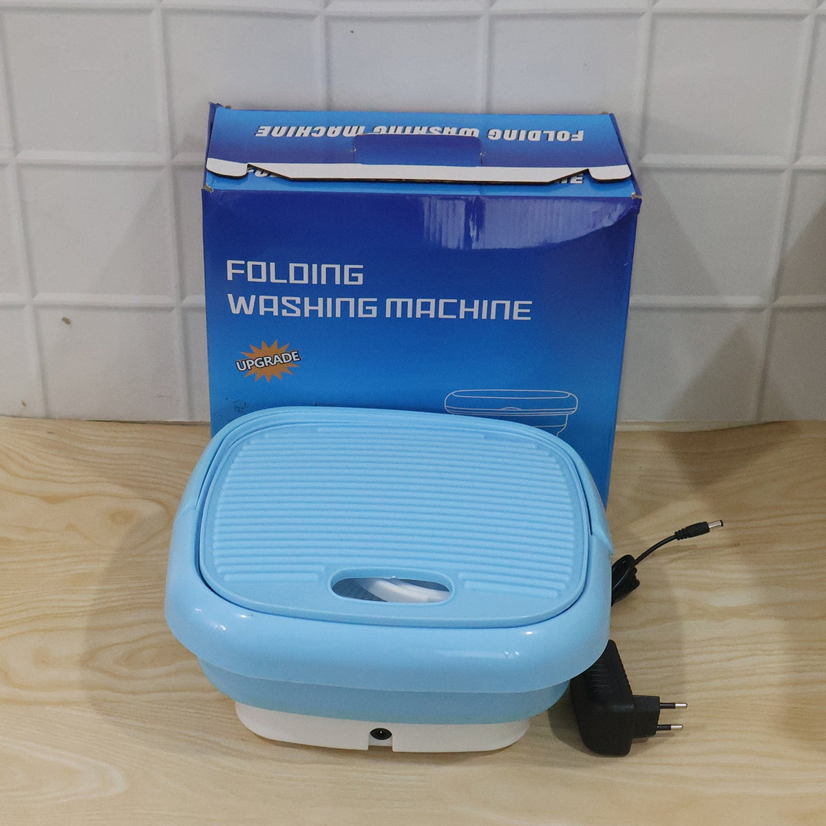 The Mini Portable Washing Machine gently washing delicate clothes, ensuring hygiene.