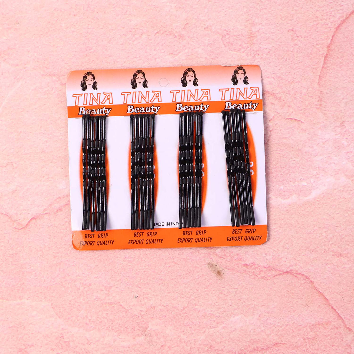 Angled view of black hair bobby pins for hairstyling